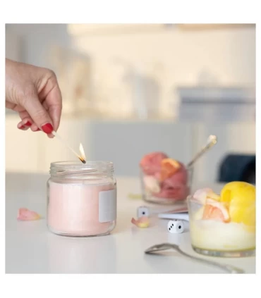 شمع معطر با ظرف شیشه ای درب دار ایکیا مدل ADELSYREN با رایحه گریپ فروت و گل رز 40 ساعتی